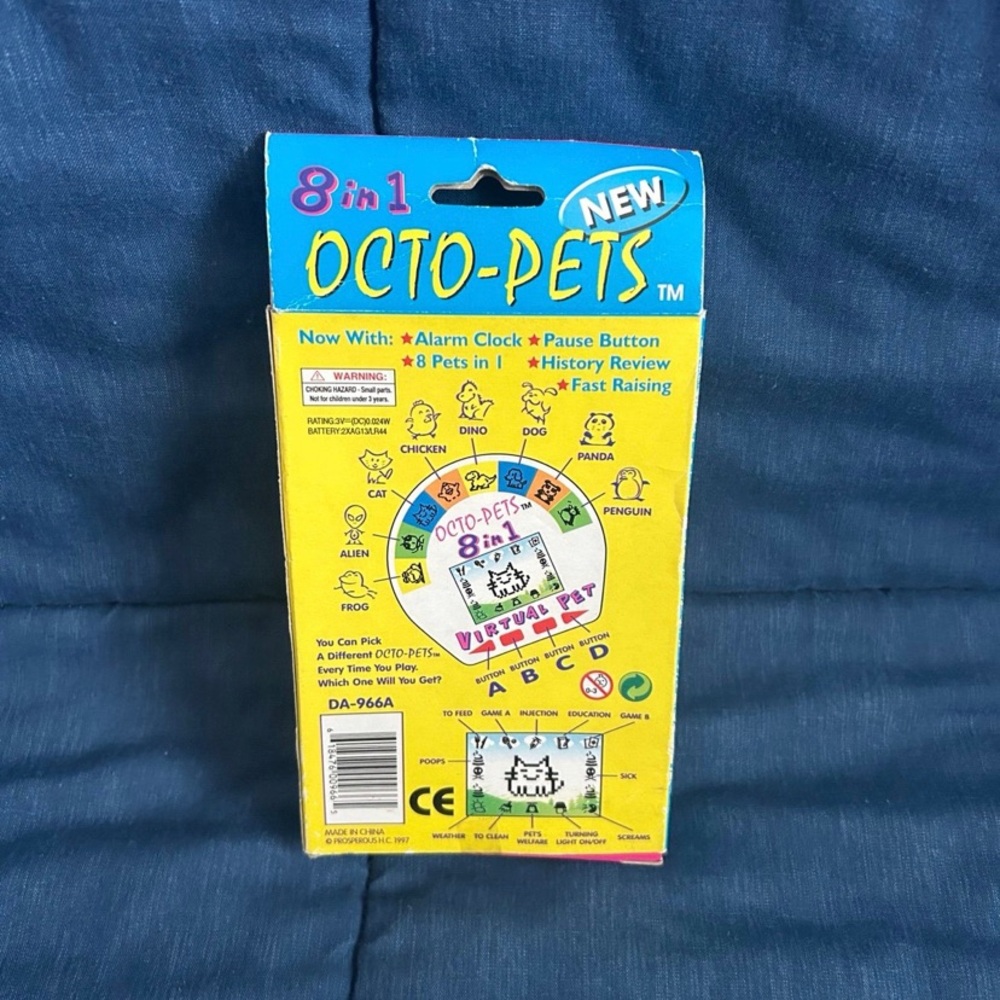 Octo-Pets 8 in 1 Virtual Pet Tamagotchi Style 1997 SEALED - Picture 12 of 12